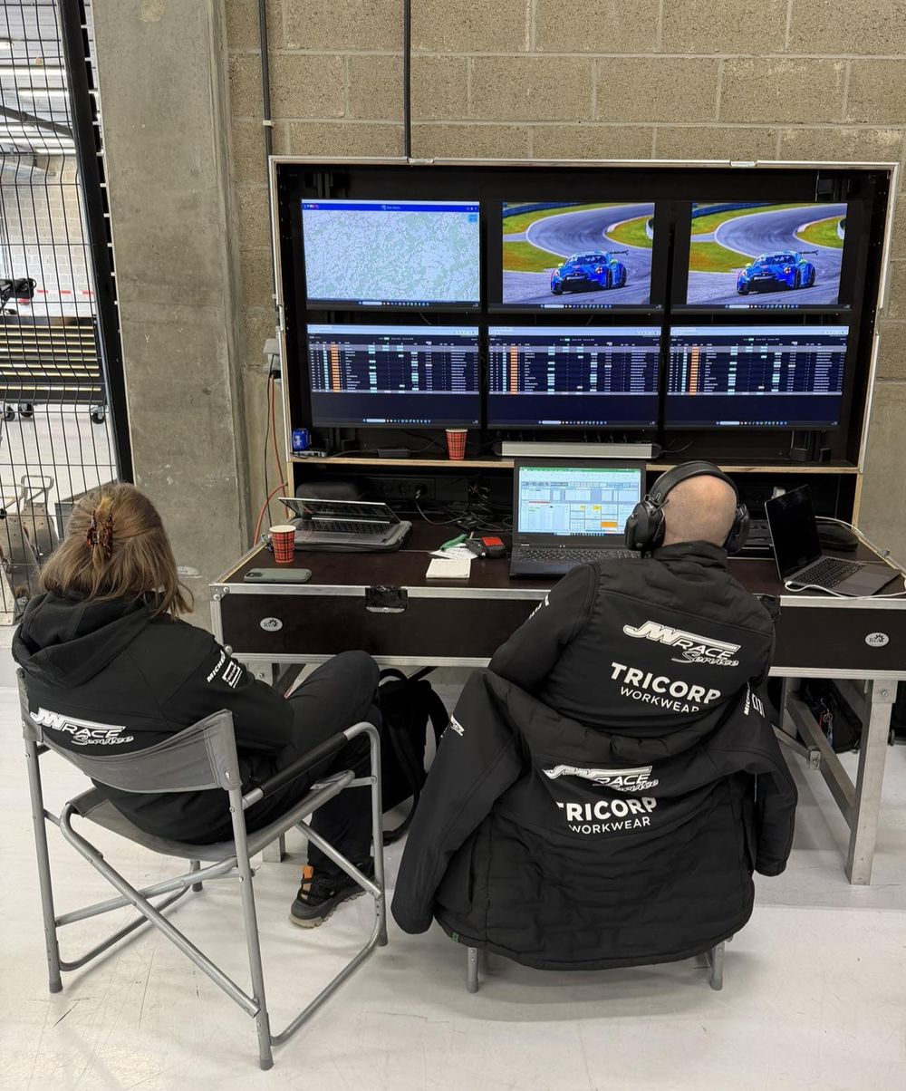 At the data station in front of the timing and onboard screens